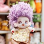 عروسک پولیشی دختر مو افشون لباس دامن دار  وارداتی ارتفاع 21سانت