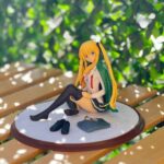 فیگور دختر نشسته با عینک ولباس وارداتی کیفیت درجه یک 15 در ۲۰ سانت